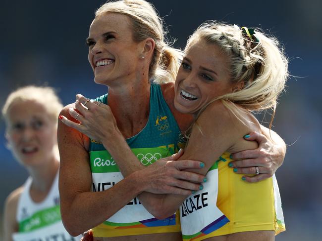 RIO DE JANEIRO, BRAZIL - AUGUST 16: Eloise Wellings (L) and Genevieve Lacaze of Australia react after the Women's 5000m Round 1 - Heat 2 on Day 11 of the Rio 2016 Olympic Games at the Olympic Stadium on August 16, 2016 in Rio de Janeiro, Brazil. (Photo by Patrick Smith/Getty Images)