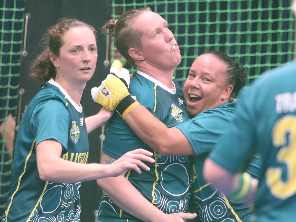 The Trans Tasman trophy for indoor cricket is being played on the Gold Coast at Ashmore. Australia v New Zealand Womens 30s . Aussies Jess Surace, Annie Davis and Mel Jecks celebrate a Davis catch.. Picture Glenn Hampson