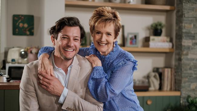 Rob Mills and Jackie Woodburne on set of Neighbours