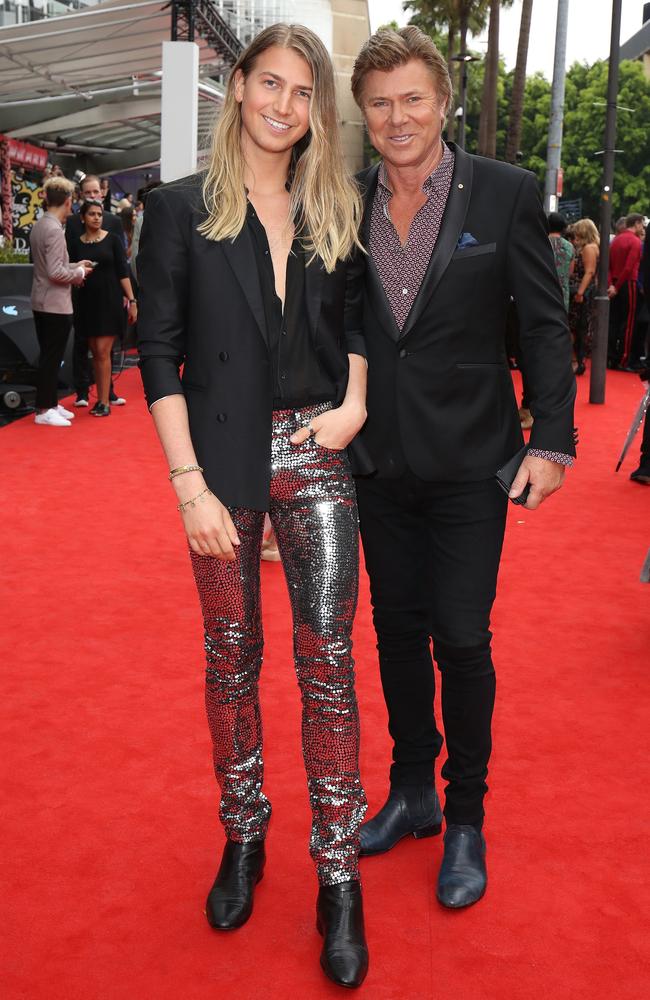 Richard Wilkins and his son arrive at the ARIAs.