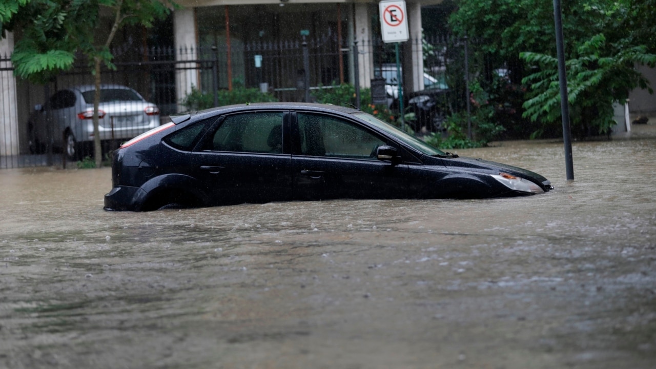 Torrential rain floods Rio de Janeiro as death toll rises | Sky News ...