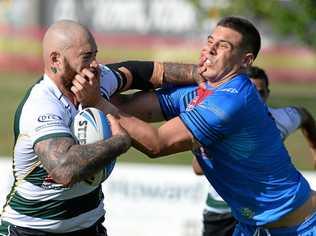 ARM WRESTLE: Ipswich Jets captain Nat Neale displays his strength controlling the ball against Redcliffe last weekend. Picture: Rob Williams