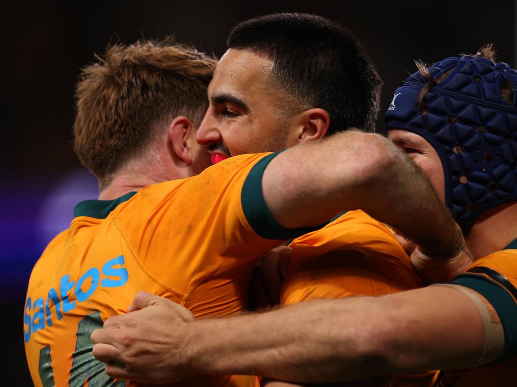 Tom Wright and his Wallabies teammates celebrate the try. Picture: Jason McCawley/Getty Images