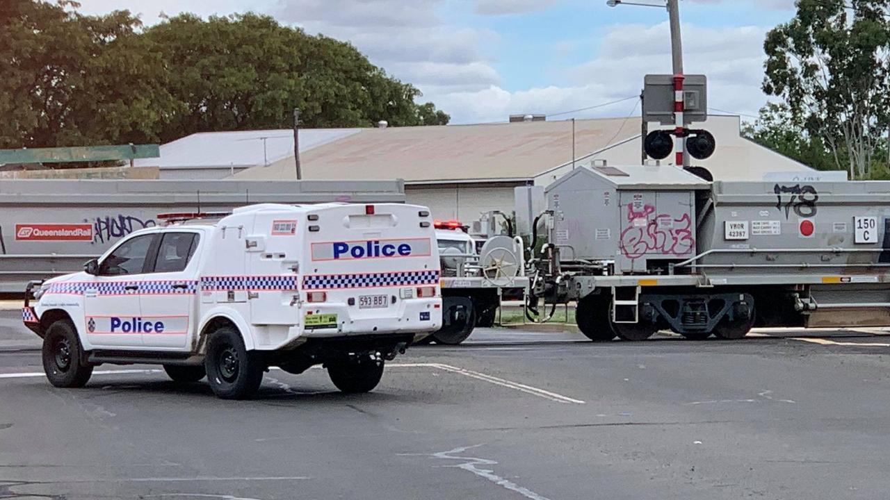 TRAIN CRASH: Emergency services rushed to a reported train and car collision on Cunningham St and Roche St on March 12. Picture: Sam Turner