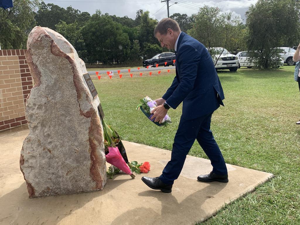 Wide Bay MP Llew O'Brien lays a wreath at the Glenwood memorial.