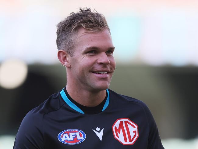 ADELAIDE, AUSTRALIA - MARCH 30: Dan Houston of the Power warms up during the 2024 AFL Round 03 match between the Port Adelaide Power and the Melbourne Demons at Adelaide Oval on March 30, 2024 in Adelaide, Australia. (Photo by James Elsby/AFL Photos via Getty Images)