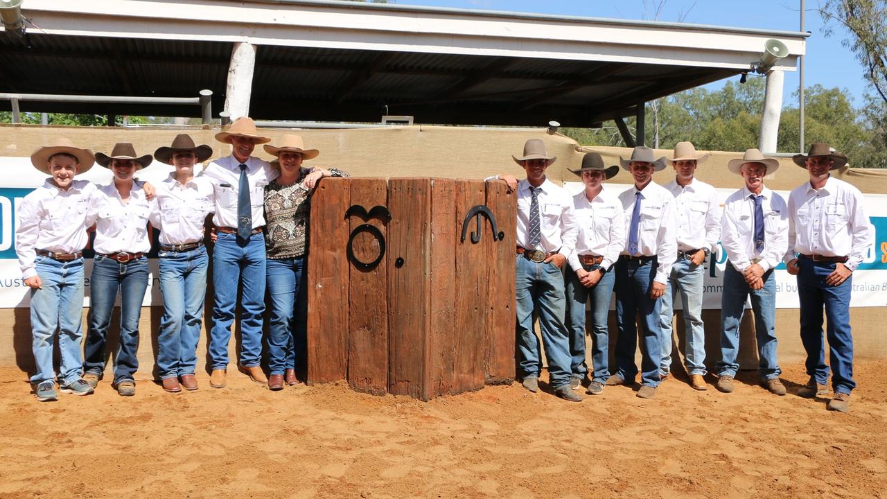 The team behind Greenup Eidsvold station with the brand displayed on the announcers box.