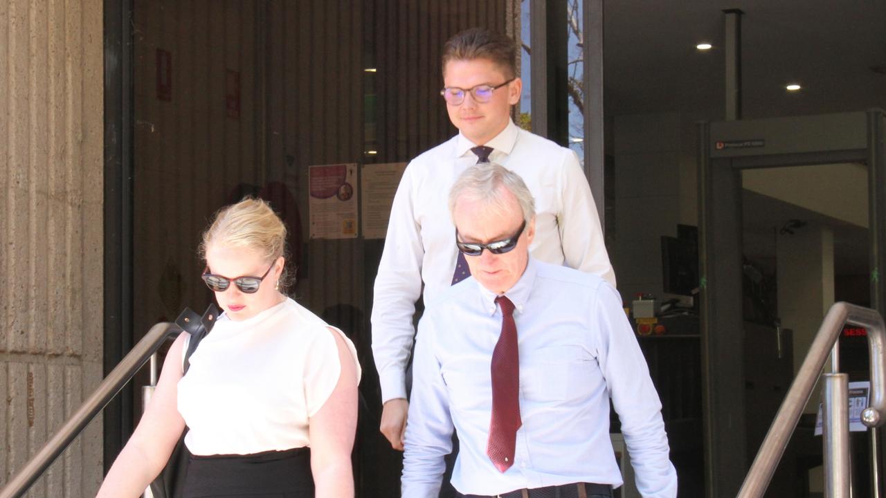 Lawyer David Robinson (right) leaves the Alice Springs Local Court. Picture: Gera Kazakov