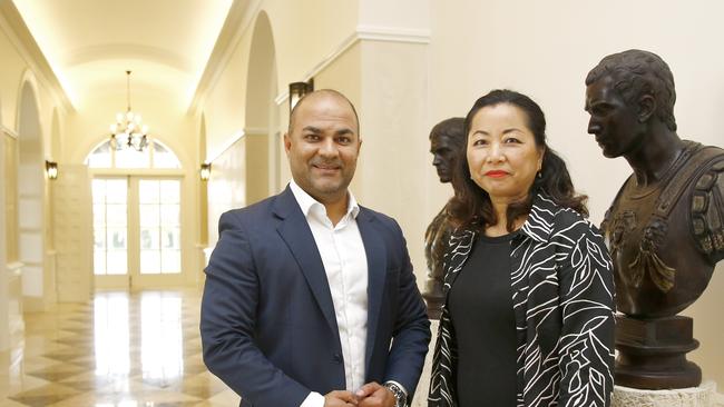 Amir Mian, principal of Amir Prestige, with sales agent Faith Liu.