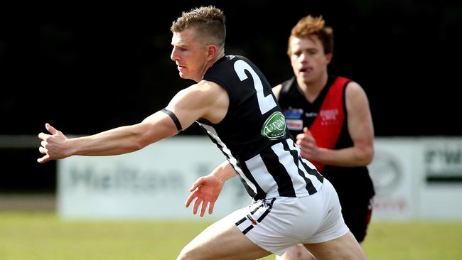 Brenton Cox in action for Wallan. Picture: Hamish Blair