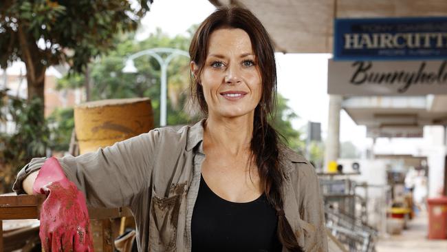 Madeleine West pictured helping clean out buildings in Lismore with a group of volunteers after the floods earlier in 2022. Picture: Jonathan Ng