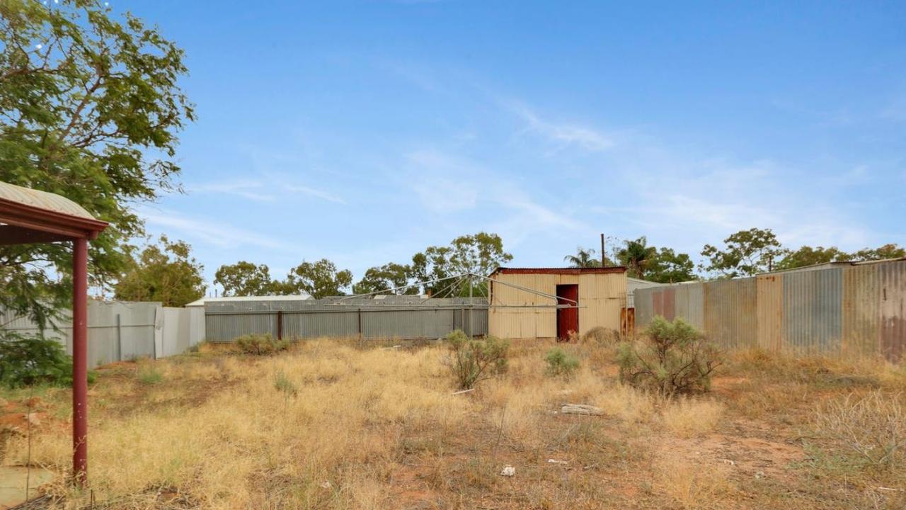 A view of the backyard of the property.