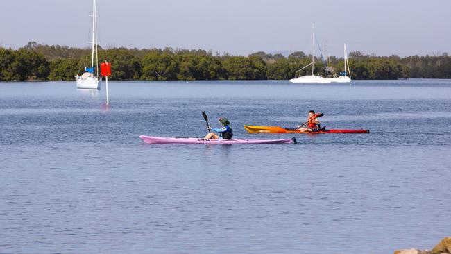 Take time out for a paddle off Nudgee Beach. Picture: Renae Droop