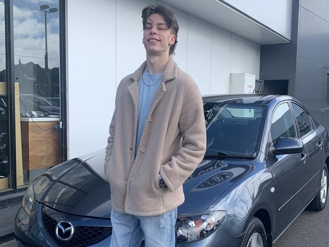 Ethan Ashton at the car yard the day he was scouted. Picture: Supplied