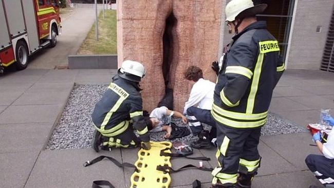 That’s not in the Kama Sutra! Rescue personnel assess the scene after a student became trapped at Tubingen University, Germany. Picture: Erik Guzman / imgur