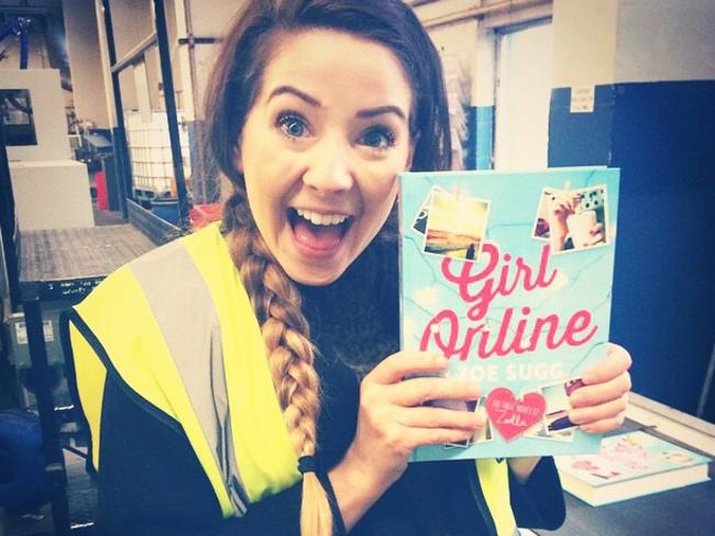 Zoella with her debut novel, ‘Girl Online’. Photo: @zozeebo.