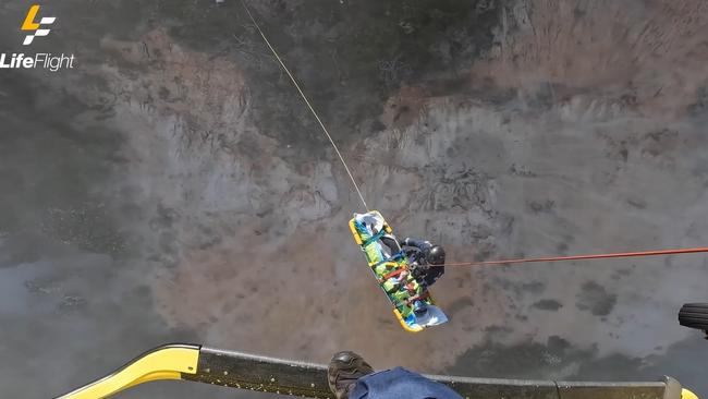 A video released by LifeFlight shows one of two paragliders being winched from a cliff slide following a collision. Photo: contributed