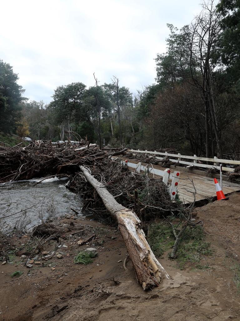 The wooden bridge on Glen Dhu Road that has been destroyed by flood water. Picture: LUKE BOWDEN