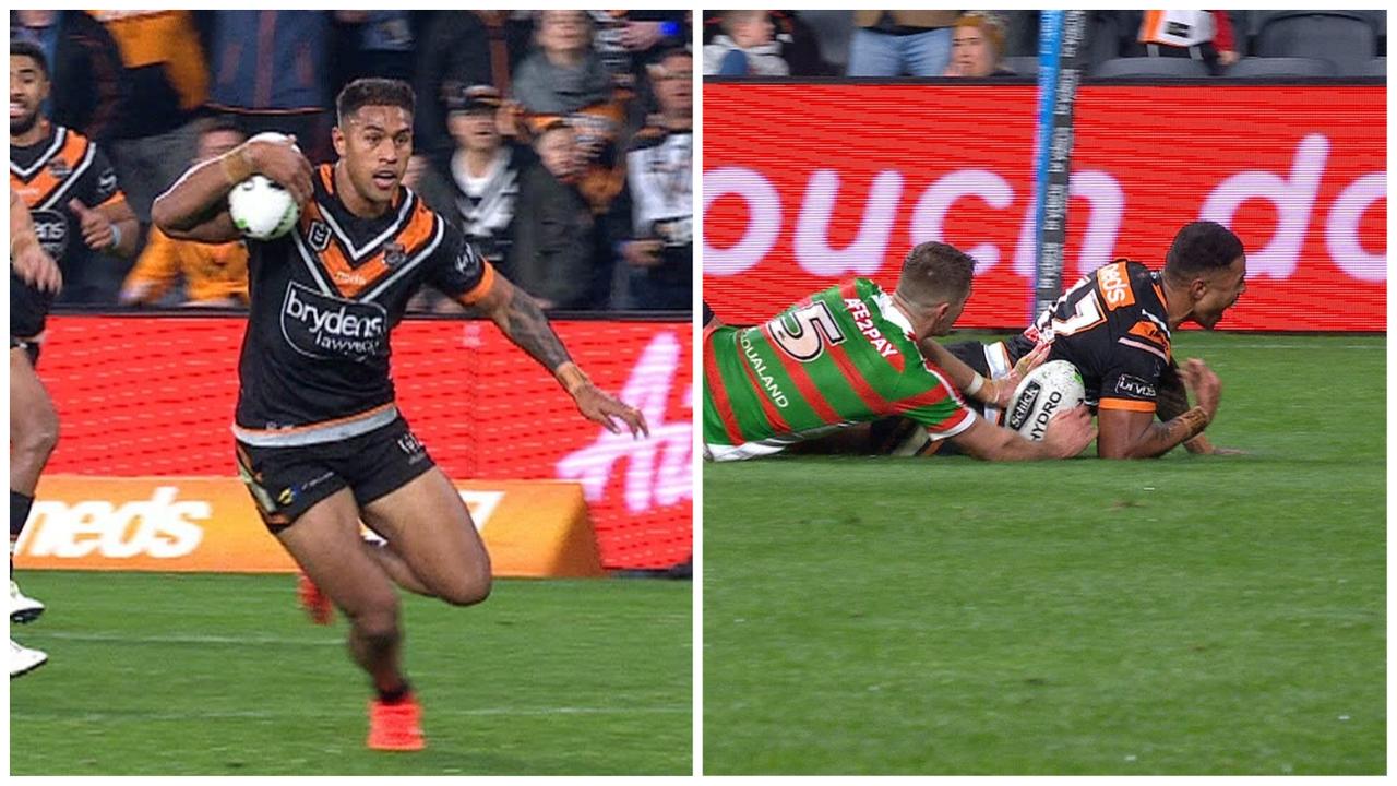Michael Chee Kam scores the matchwinning try for the Wests Tigers against Rabbitohs.