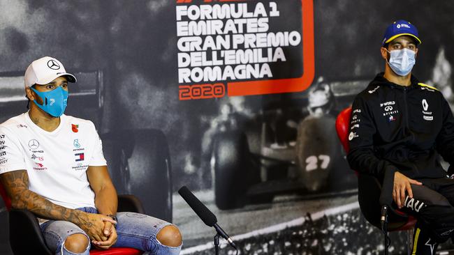 Race winner Lewis Hamilton and third placed Daniel Ricciardo speak to media after the race. Picture: Getty Images