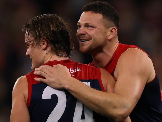 PERTH, AUSTRALIA - SEPTEMBER 10: Steven May and Trent Rivers of the Demons celebrate after the Demons defeated the Cats during the AFL First Preliminary Final match between Melbourne Demons and Geelong Cats at Optus Stadium on September 10, 2021 in Perth, Australia. (Photo by Paul Kane/Getty Images)