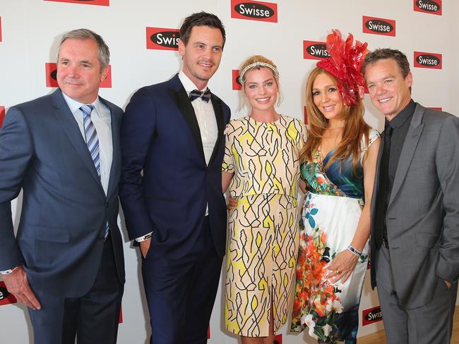 Margot Robbie with former Neighbours actors Alan Fletcher, Totti Goldsmith, Stefan Dennis and Dan OConnor in Melbourne in 2014. Picture: Scott Barbour/Getty Images