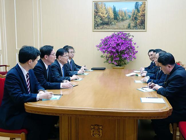 The South Korean delegation talk with General Kim Yong-chol (second right), who is in charge of inter-Korean affairs for North Korea’s ruling Workers’ Party. Picture: The Blue House/AFP