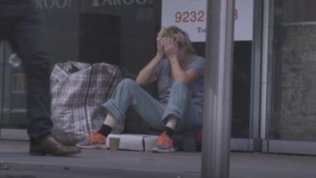 To this … Leckie buries her head in her hands as the emotion takes its toll during filming of Filthy Rich &amp; Homeless. Picture: SBS