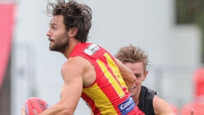 Lachie Weller was everywhere as the Suns upset Port Adelaide. Picture: Russell Freeman/AFL Photos via Getty Images