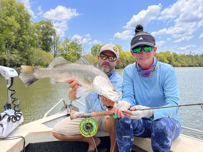 07/12/2023 - 1.	Arnhem Land Barramundi Lodge guide, Vinnie Versefield, with Darwin’s Cathie Bassett who attended Arnhem Land Fly Fishing Week. Picture: Roger Bassett