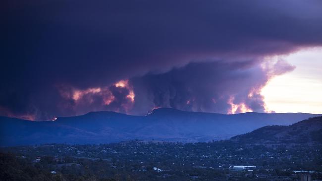 A defence helicopter's landing light is believed to have started the Orroral Valley fire in Namadgi National Park south of Canberra. Picture: Gary Ramage