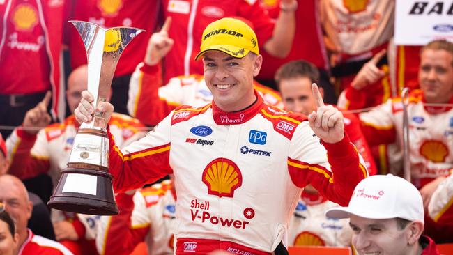 Ford driver Scott McLaughlin celebrates his Supercars triumph last year. Picture: Getty