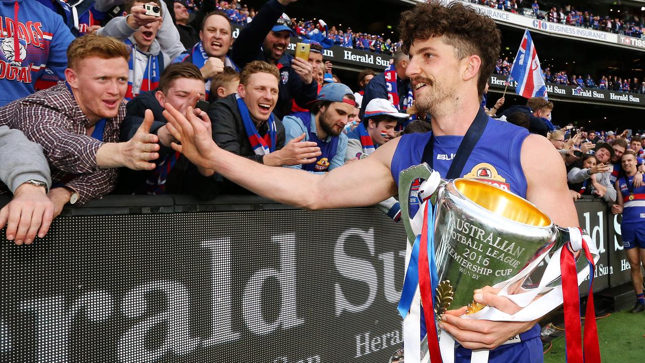 Tom Liberatore celebrates with fans after the 2016 Grand Final. Picture: Mark Stewart