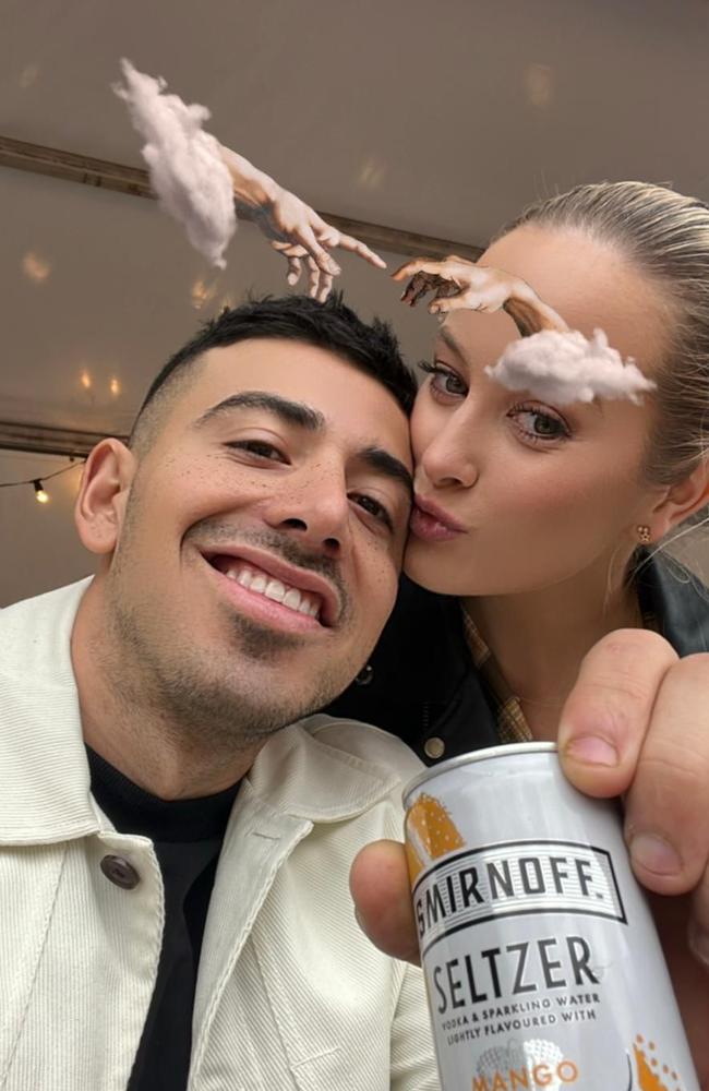 Simone Holtznagel and personal trainer boyfriend Jono Castano inside the exclusive Smirnoff Seltzer Springs marquee at Splendour 2022. Picture: Supplied