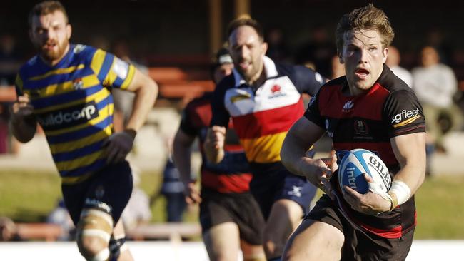 Action in the match between Sydney University and Northern Suburbs last year. Pic: Karen Watson.