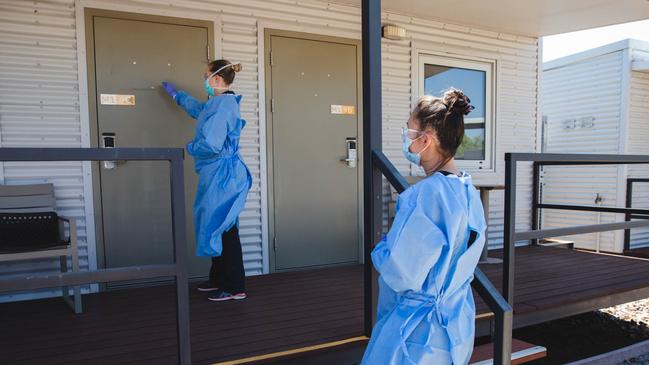 NT Health workers check in on a resident at the Howard Springs quarantine facility. Picture: Supplied/ NT Health