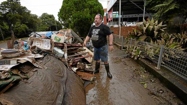 Brett Grainger, of South Lismore, helps to clean up town. Picture: Marc Stapelberg