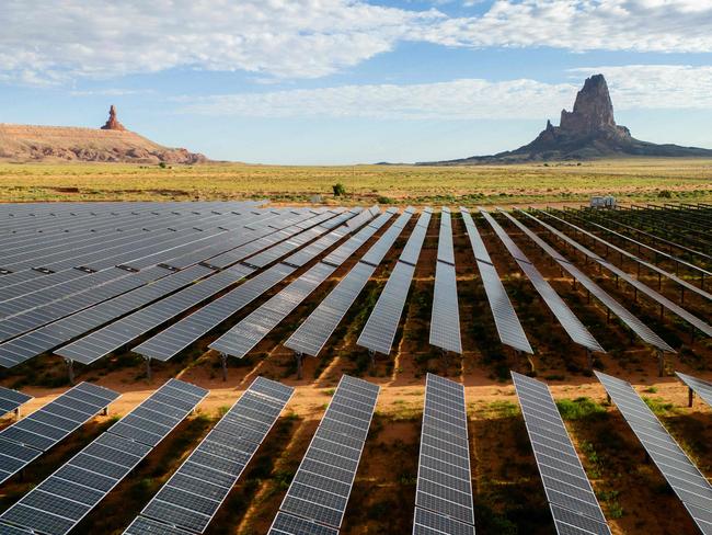 KAYENTA, ARIZONA - JUNE 23: In an aerial view, the Kayenta Solar Plant is seen on June 23, 2024 in Kayenta, Arizona. In late February, the U.S. Department of Energy announced that it would begin plans to provide $76.5 million in federal financing to the Navajo Nation's Red Mesa Tapaha Solar Farm in southeast Utah. The move is intended to provide tribal lands with greater accessibility to power grids and further generate energy sales for the nonprofit Navajo Tribal Utility Authority. The nonprofit oversees and provides power to approximately 40,000 homes within the Navajo Nation, spanning portions of southeast Utah, northeast Arizona and northwestern New Mexico.   Brandon Bell/Getty Images/AFP (Photo by Brandon Bell / GETTY IMAGES NORTH AMERICA / Getty Images via AFP)