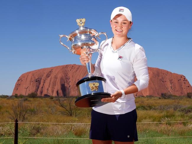 Australian tennis player,Ash Barty, visits Uluru with the Australian Open trophy. Picture: Tennis Australia