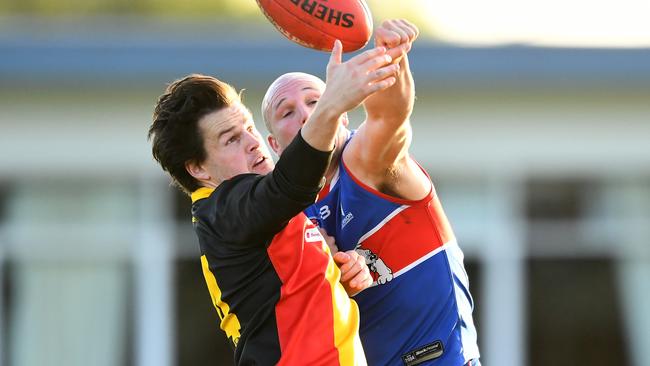 SFNL: Cheltenham’s Daniel Vaughan attempts to mark. Picture: Josh Chadwick