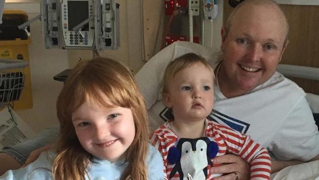 JAarrod Lyle with his daughters Lusi and Jemma as he fought his illness from his hospital bed. Picture: Lyle’s Instagram account