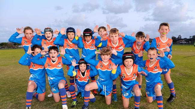 Armstrong Creek Blue Sharks under-9 football team pull their funniest faces. Picture: Mark Wilson
