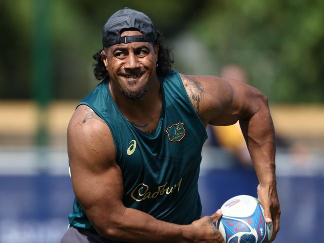 SAINT-ETIENNE, FRANCE - AUGUST 31: Pone Fa'amausili passes during an Australia Wallabies training session ahead of the Rugby World Cup France 2023, at Stade Roger Baudras on August 31, 2023 in Saint-Etienne, France. (Photo by Chris Hyde/Getty Images)