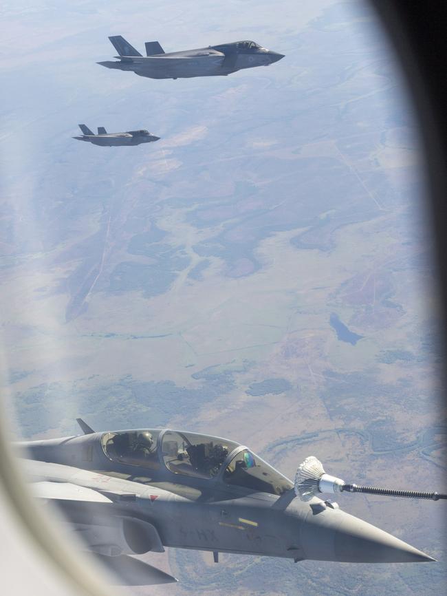 A French Rafale jet refuels mid-air about 100km south of Darwin. Picture: Floss Adams.