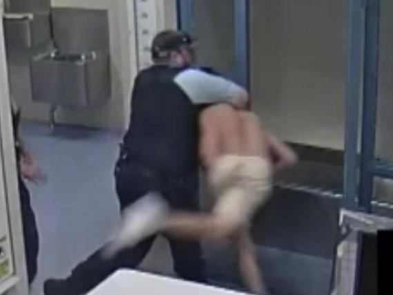 Footage shows the serving police officer assaulting an Indigenous man in custody at Goulburn Police Station. Picture: ABC