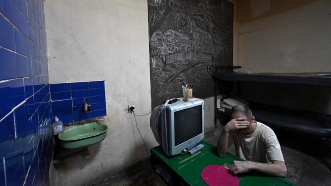 In this photograph taken on July 21, 2022, A Russian prisoner of war, sits in a cell at Lukyanivska Prison in Kyiv, amid the Russian invasion of Ukraine. Sergeant Nikolai Matveev is one of the conflict's first prisoners of war. Picture: AFP