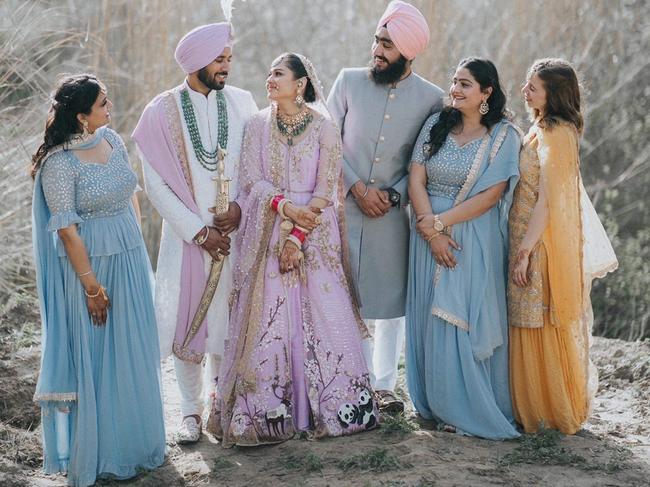 Pearl and Rupinder on their Wedding Day with Pearl’s brother Jaideep and some friends