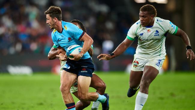 Waratahs skipper Jake Gordon is tackled during his side’s Super Rugby Pacific win over Fijian Drua. Picture: Brett Hemmings/Getty Images