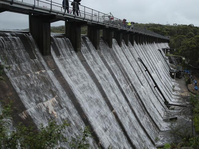 Manly dam above North Manly is overflowing putting more stress on the Manly lagoon catchment area . Pic John Grainger