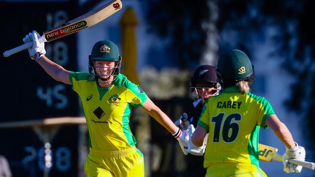 A beaming Meg Lanning enjoys a hundred against New Zealand.